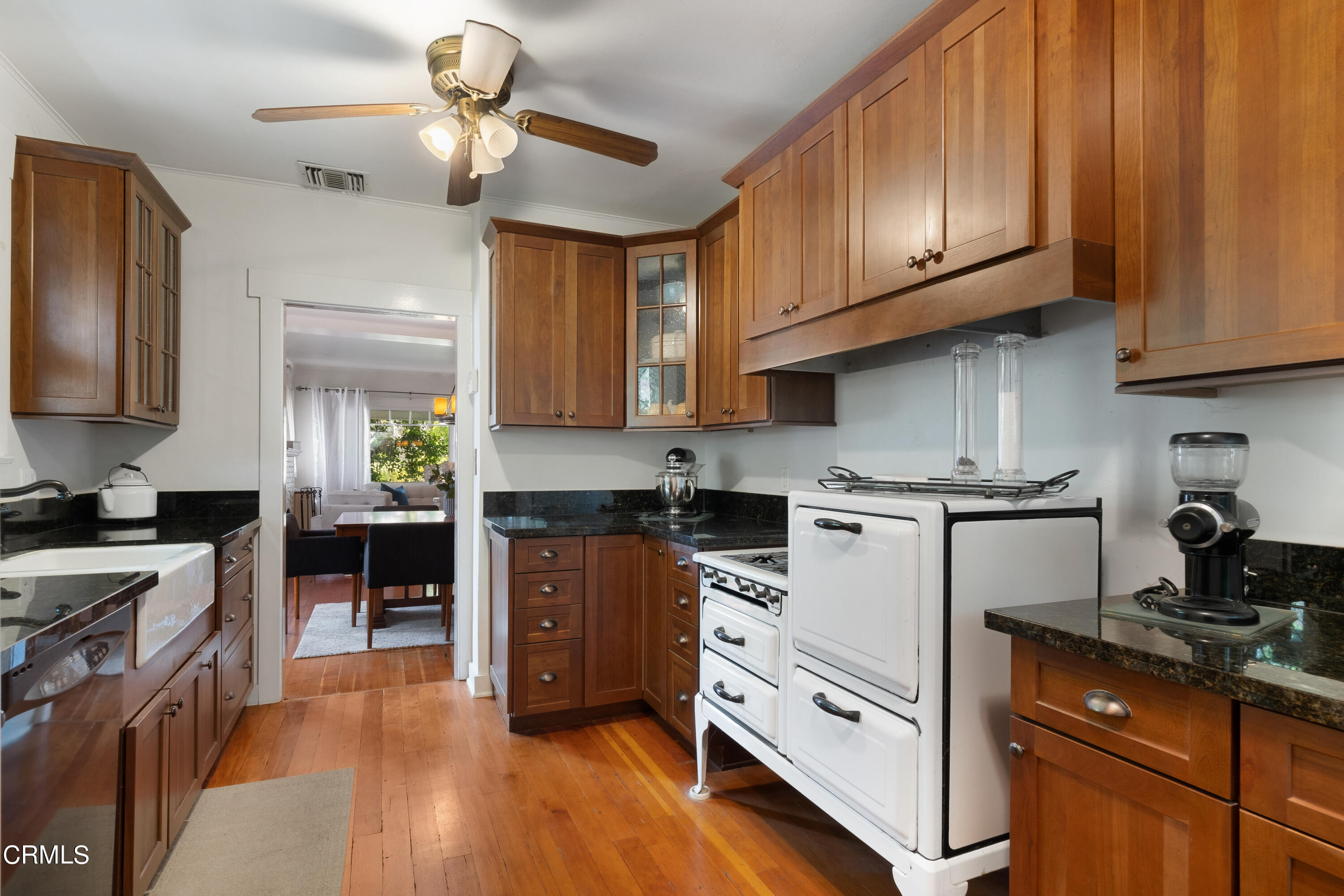 1640 Brigden Road Pasadena, CA 91104 - Photo 15 of 39 a kitchen with stainless steel appliances granite countertop a stove and cabinets