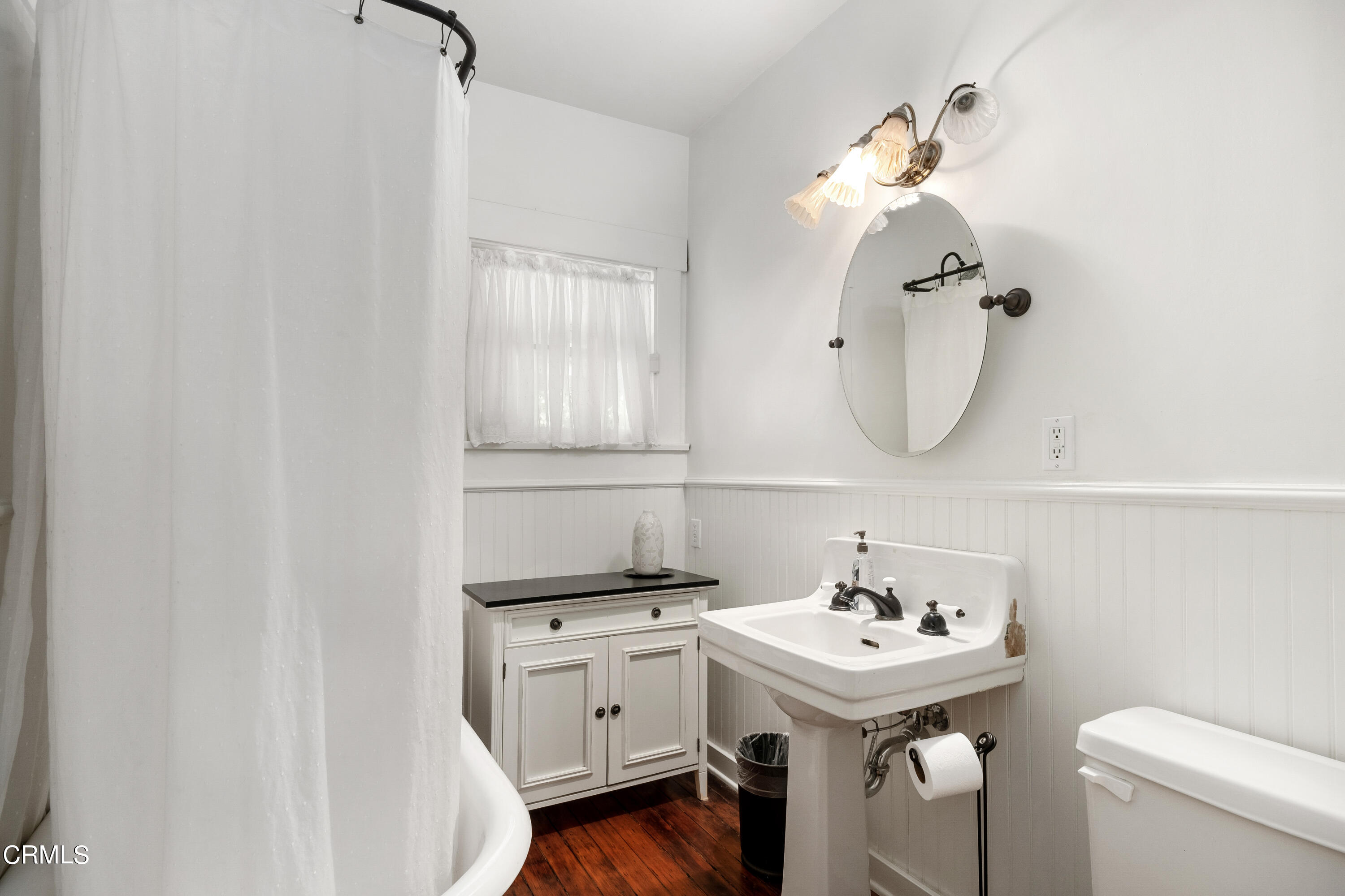 1640 Brigden Road Pasadena, CA 91104 - Photo 20 of 39 a bathroom with a sink a toilet and a mirror