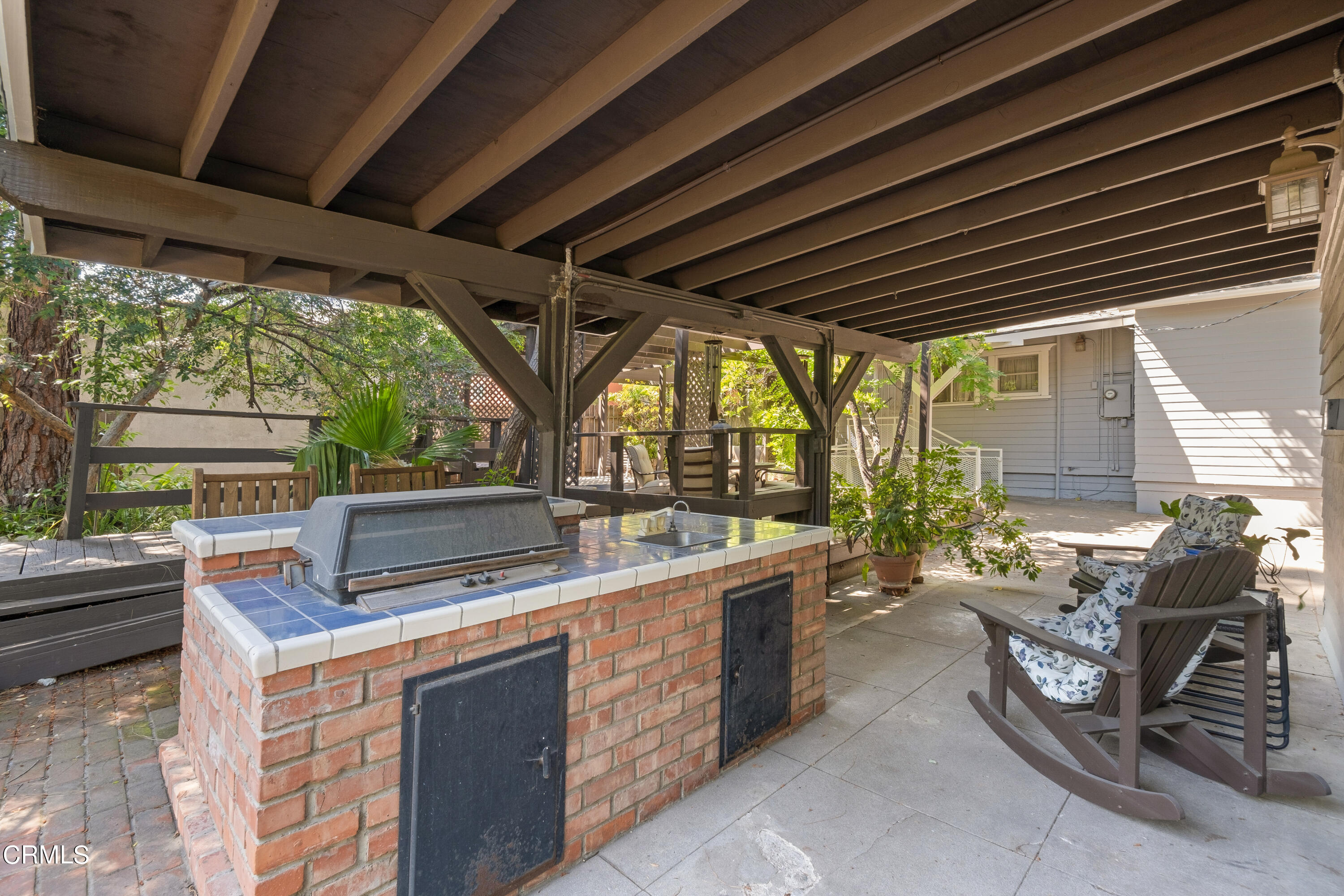1640 Brigden Road Pasadena, CA 91104 - Photo 24 of 39 a view of a chairs and table in the patio