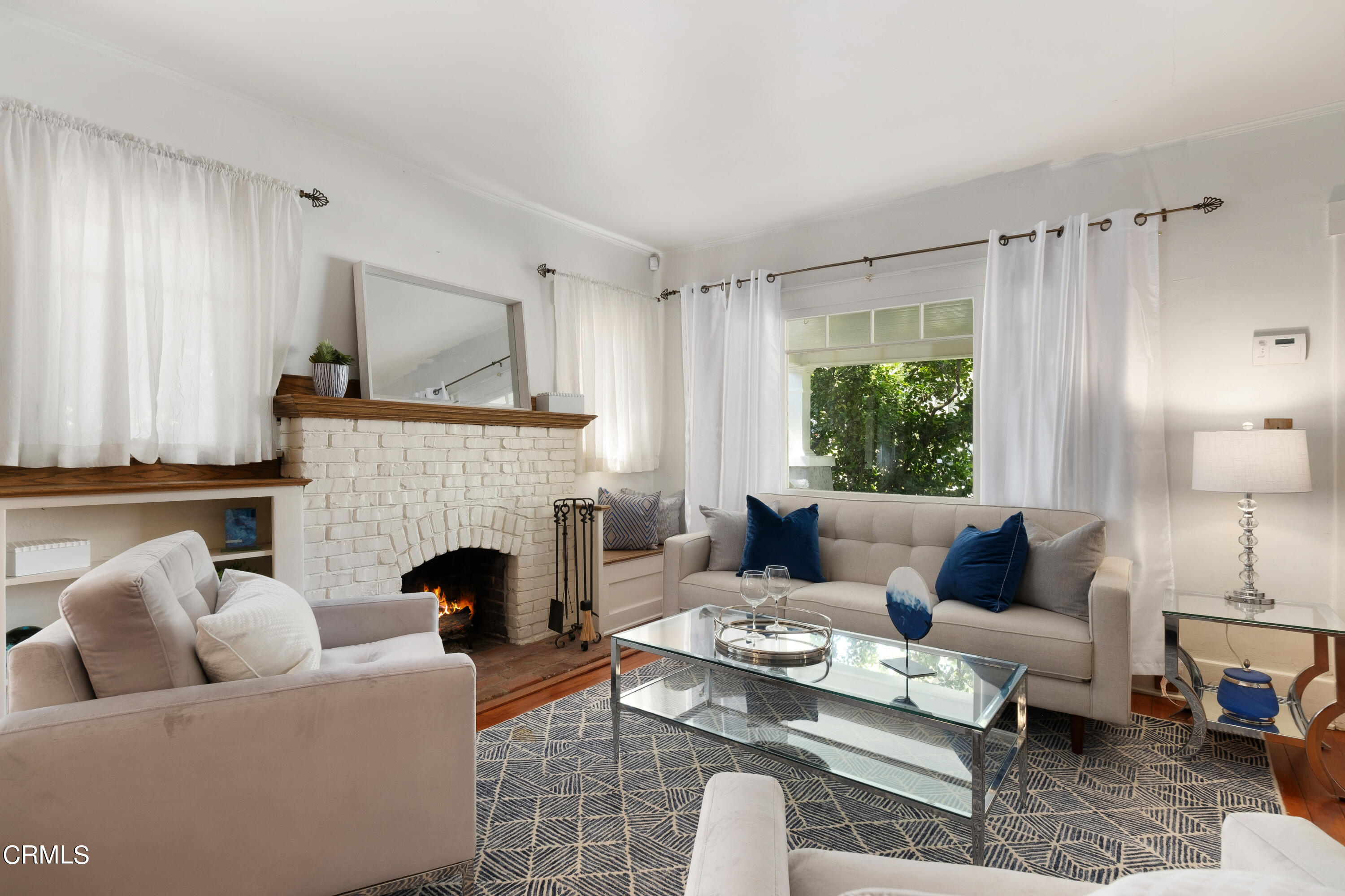 1640 Brigden Road Pasadena, CA 91104 - Photo 7 of 39 a living room with furniture fireplace and a large window