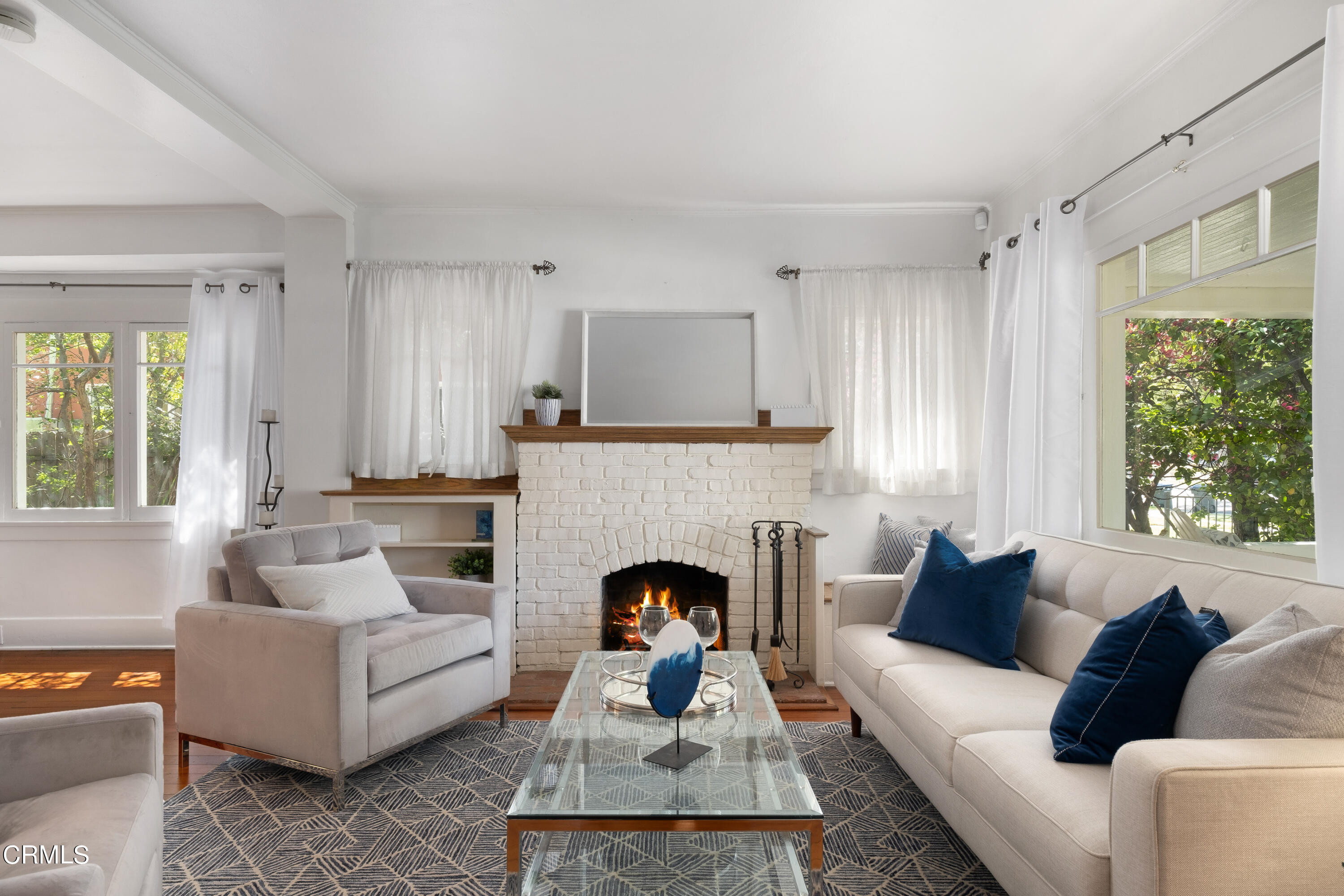 1640 Brigden Road Pasadena, CA 91104 - Photo 9 of 39 a living room with furniture and a fireplace