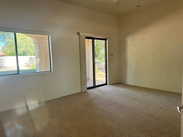 an empty room with windows