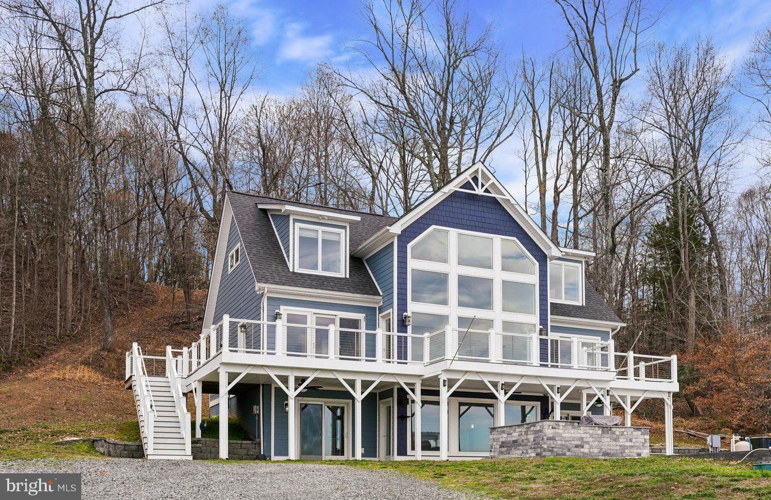 a front view of residential houses with yard
