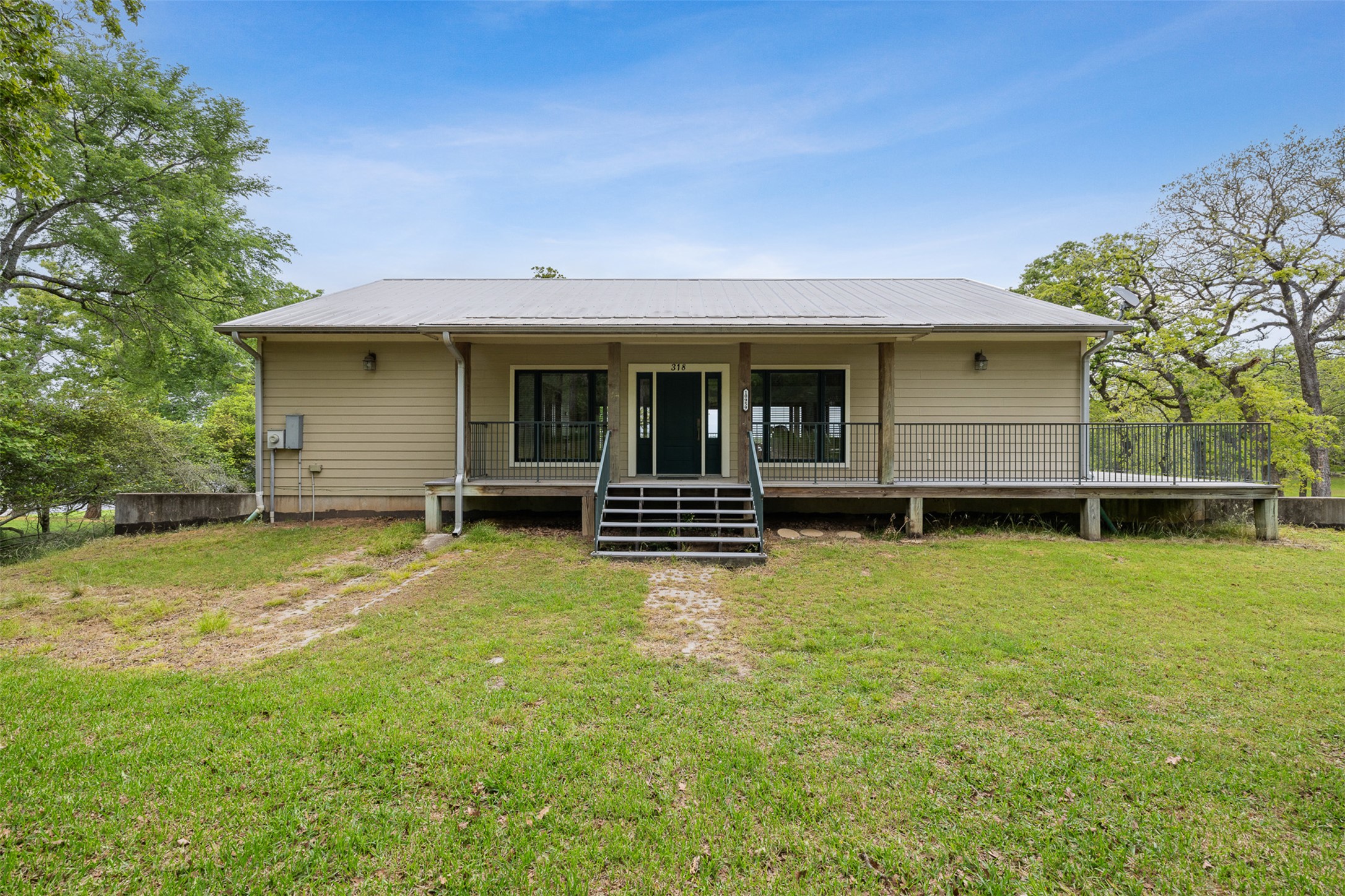 10959 Clyde Acord Road Franklin, TX 77856 - Photo 6 of 39 a view of a house with a backyard