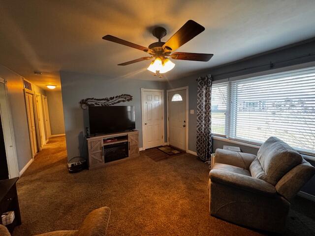 411 Prescott Road Valparaiso, IN 46385 - Photo 3 of 14 a living room with furniture and a flat screen tv