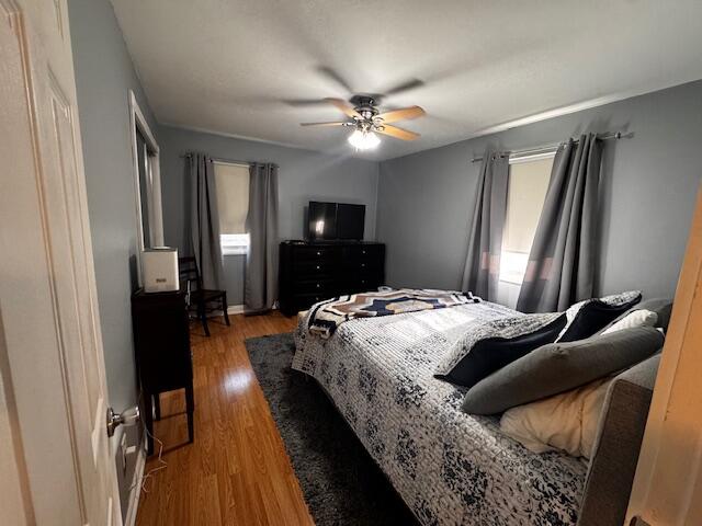 411 Prescott Road Valparaiso, IN 46385 - Photo 8 of 14 a bedroom with bed and wooden floor