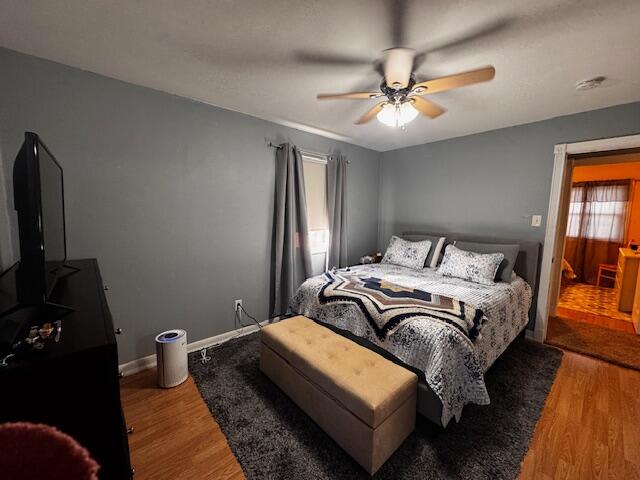 411 Prescott Road Valparaiso, IN 46385 - Photo 9 of 14 a bedroom with bed and a chandelier