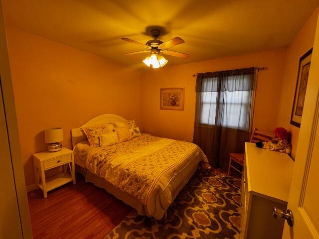 411 Prescott Road Valparaiso, IN 46385 - Photo 10 of 14 a bedroom with a bed and a chandelier