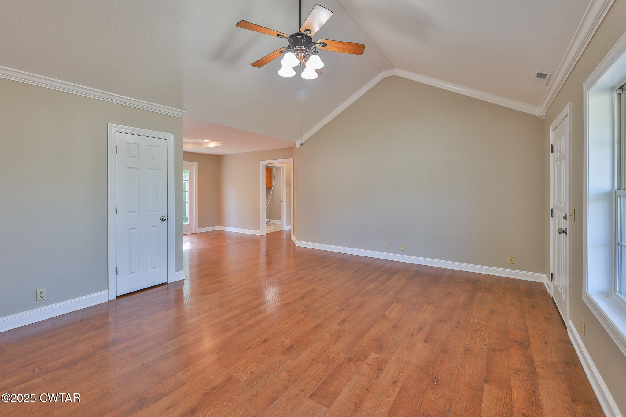 679 North Main Street Dyer, TN 38330 - Photo 12 of 25 a view of an empty room with wooden floor