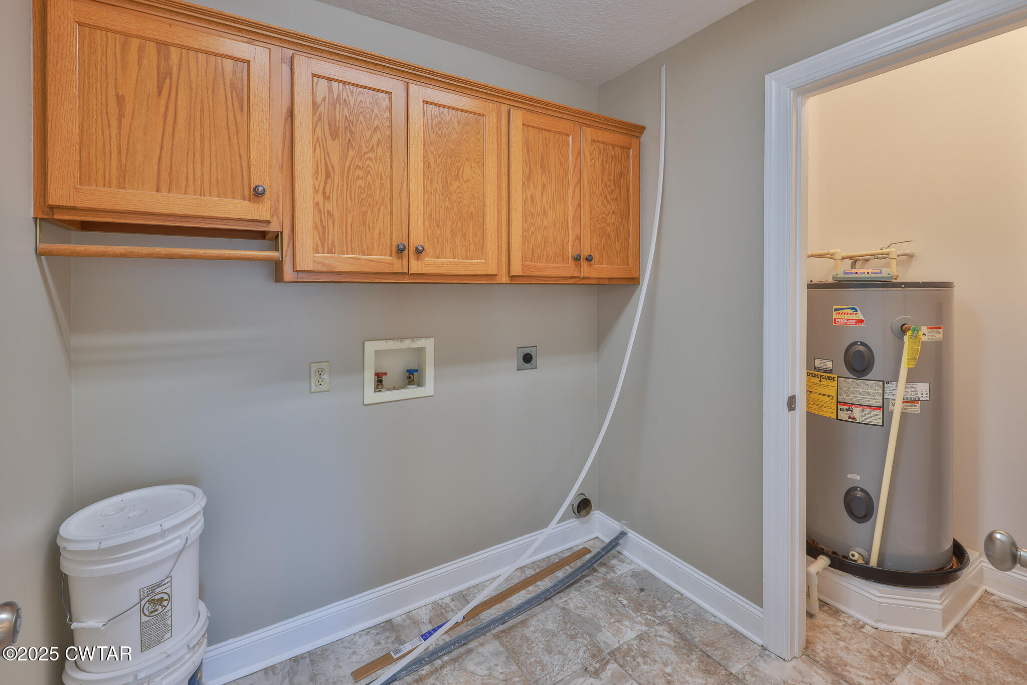 679 North Main Street Dyer, TN 38330 - Photo 18 of 25 a view of storage and utility room with a sink