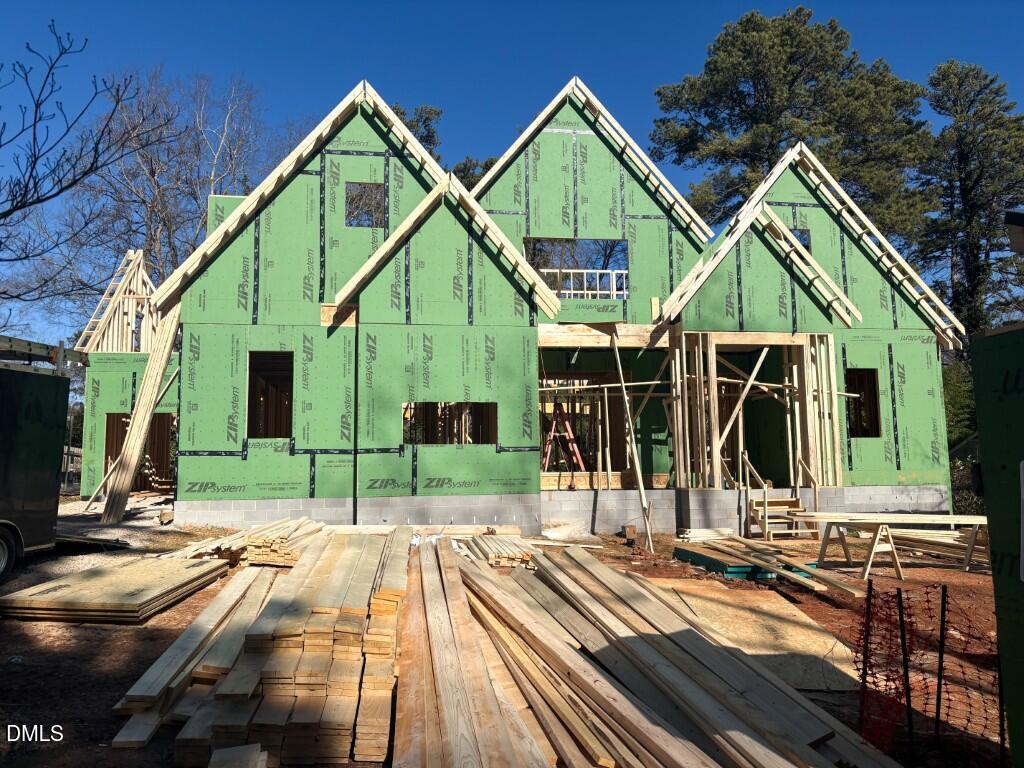 a view of a house with wooden floor and a park