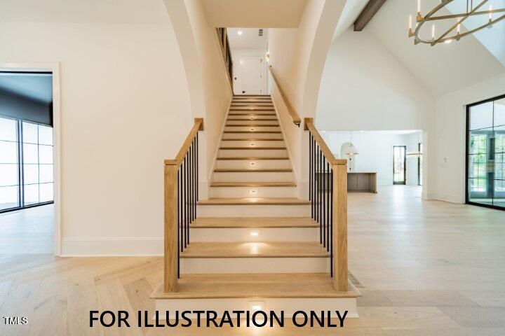 3422 Redbud Lane Raleigh, NC 27607 - Photo 4 of 13 a view of entryway and hall with wooden floor