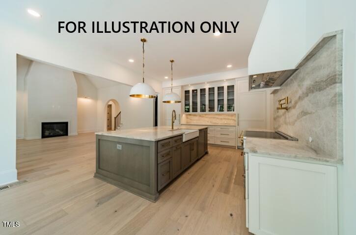 3422 Redbud Lane Raleigh, NC 27607 - Photo 7 of 13 a large white kitchen with a large stove a sink and dishwasher
