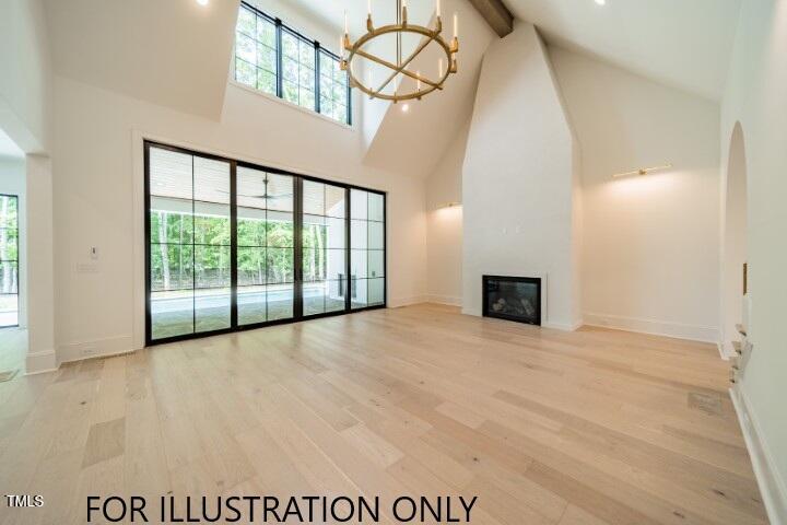 3422 Redbud Lane Raleigh, NC 27607 - Photo 8 of 13 a view of an empty room with a fireplace and a window