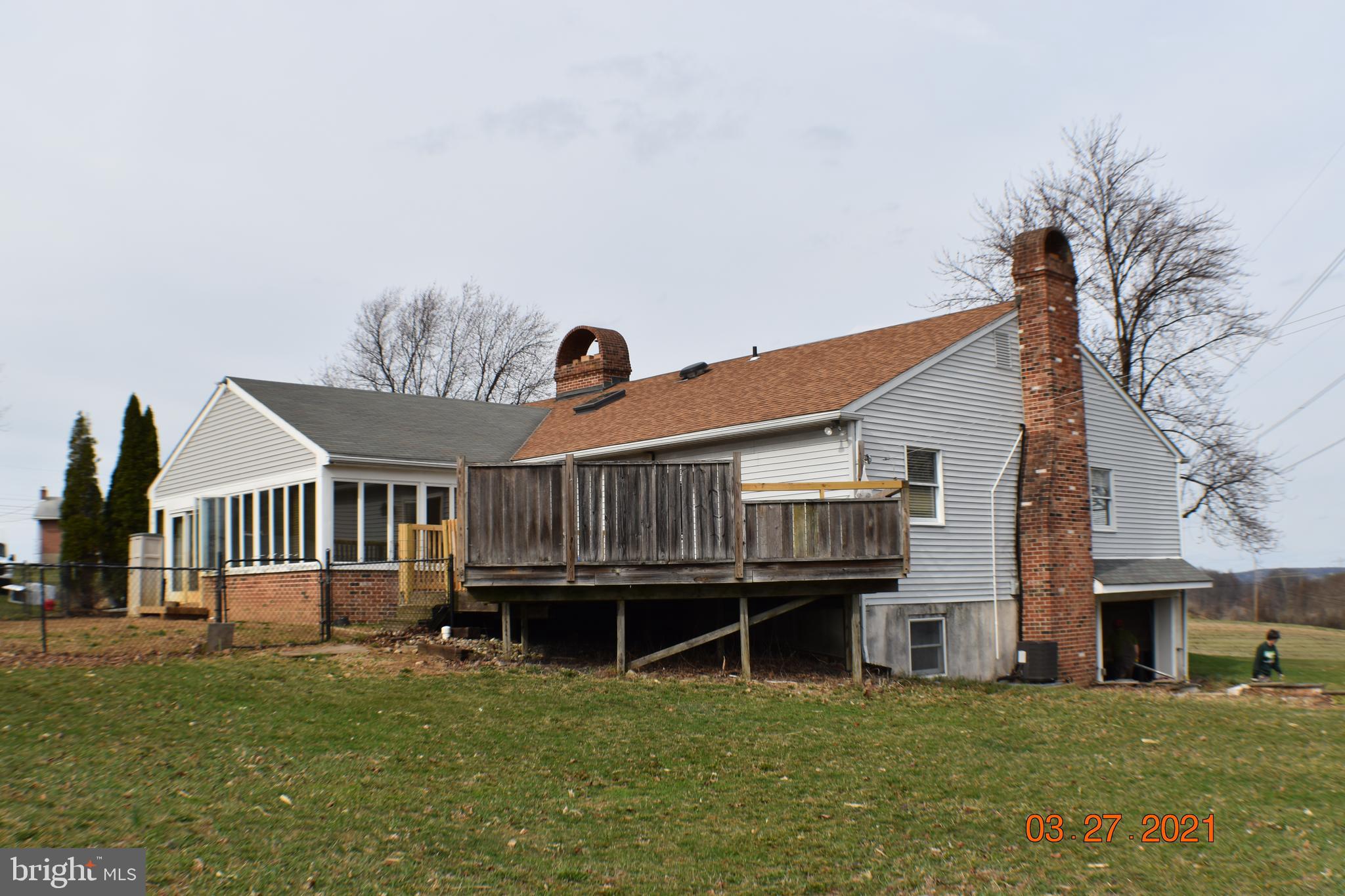 2075 Trolley Bridge Road Quakertown, PA 18951 - Photo 2 of 42 Florida room, deck and dog fence off the back side