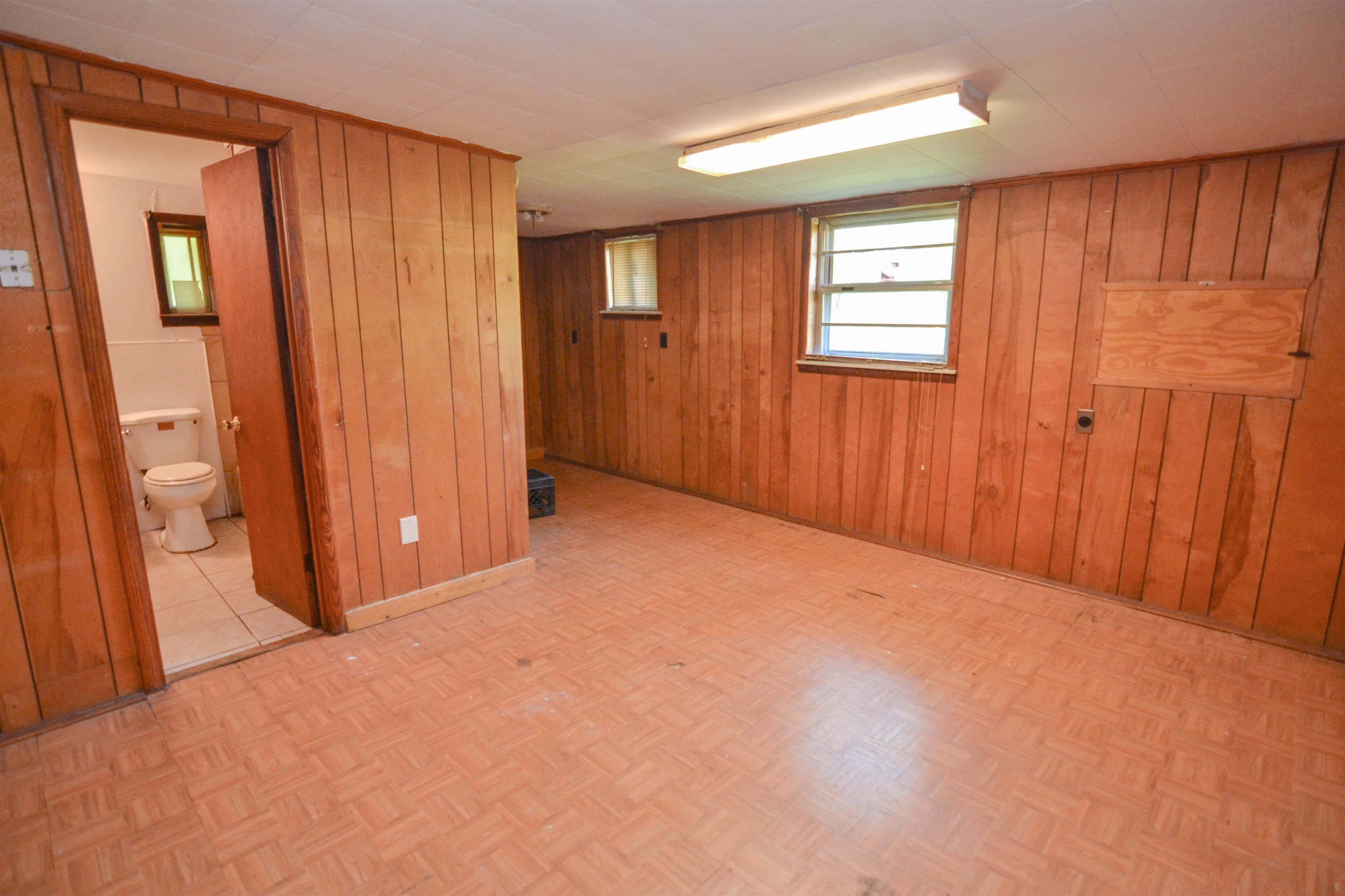 5227 Millbranch Road Memphis, TN 38116 - Photo 10 of 19 a view of an empty room with a window