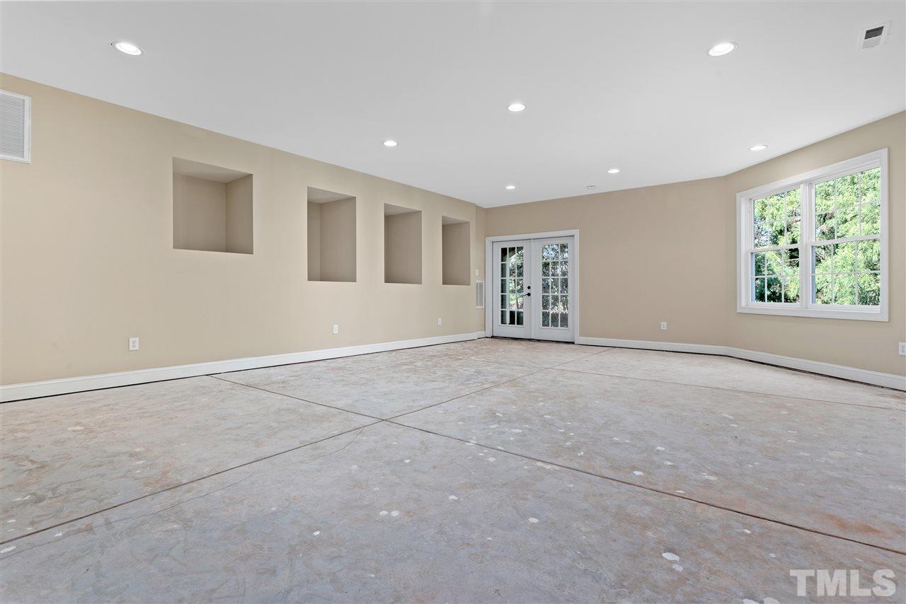 8005 Kukui Court Raleigh, NC 27613 - Photo 29 of 30 a view of an empty room with a window