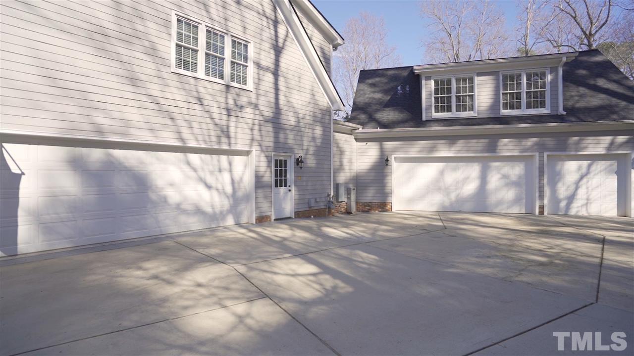 8005 Kukui Court Raleigh, NC 27613 - Photo 30 of 30 a view of a house with a street