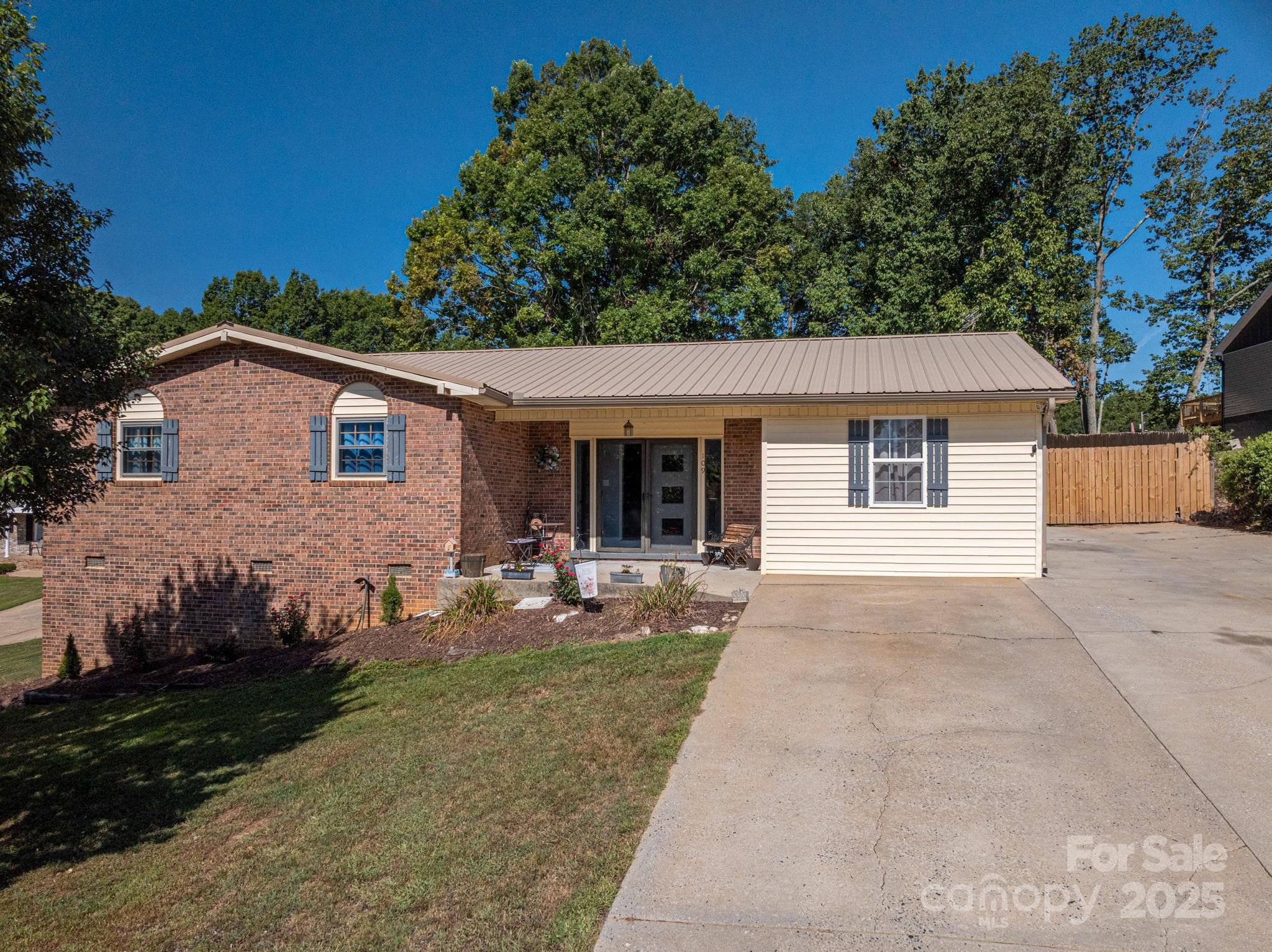 109 White Rock Road Grover, NC 28073 - Photo 1 of 37 front view of a house and a yard