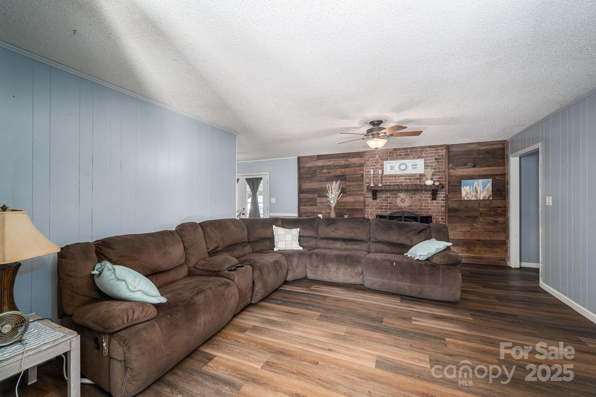 109 White Rock Road Grover, NC 28073 - Photo 2 of 37 a living room with couches and kitchen view