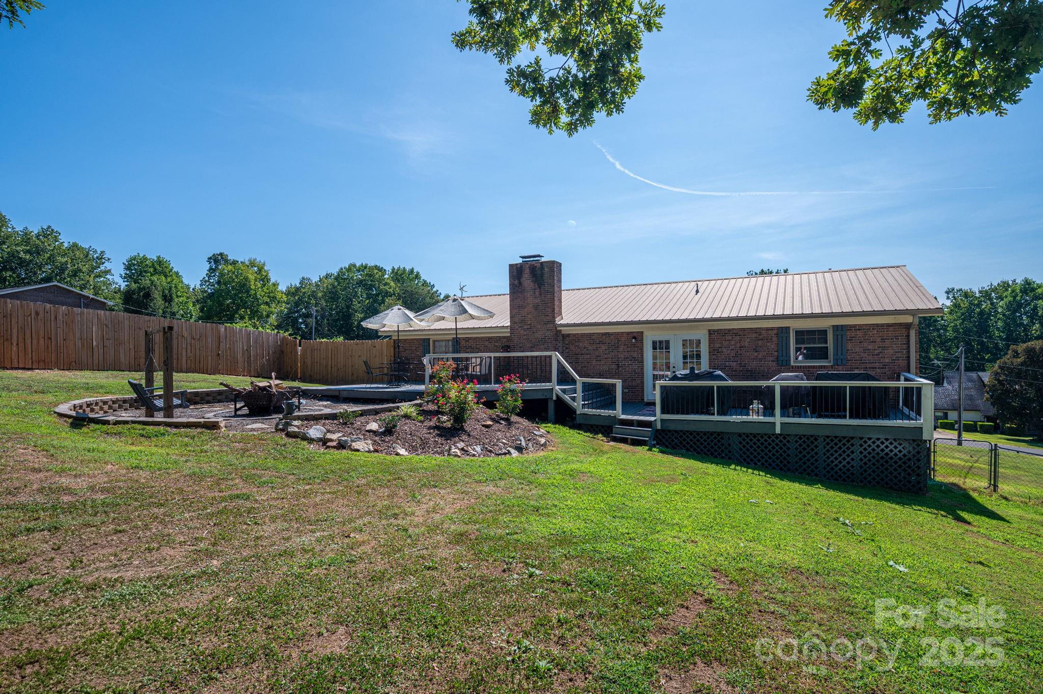 109 White Rock Road Grover, NC 28073 - Photo 27 of 37 a view of a house with garden and sitting area