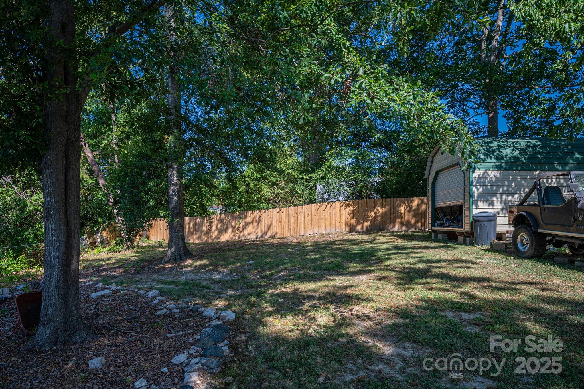 109 White Rock Road Grover, NC 28073 - Photo 29 of 37 a view of a backyard with trees