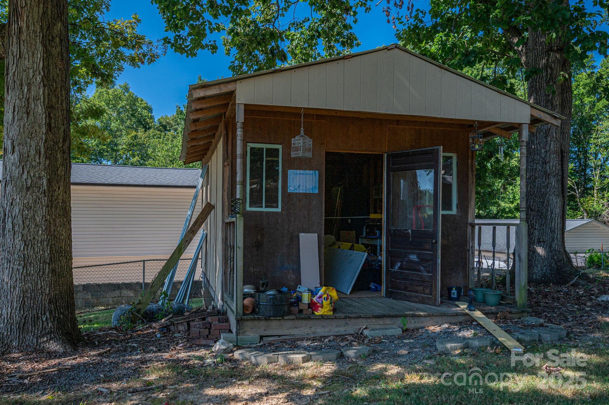109 White Rock Road Grover, NC 28073 - Photo 30 of 37 a view of a house with backyard