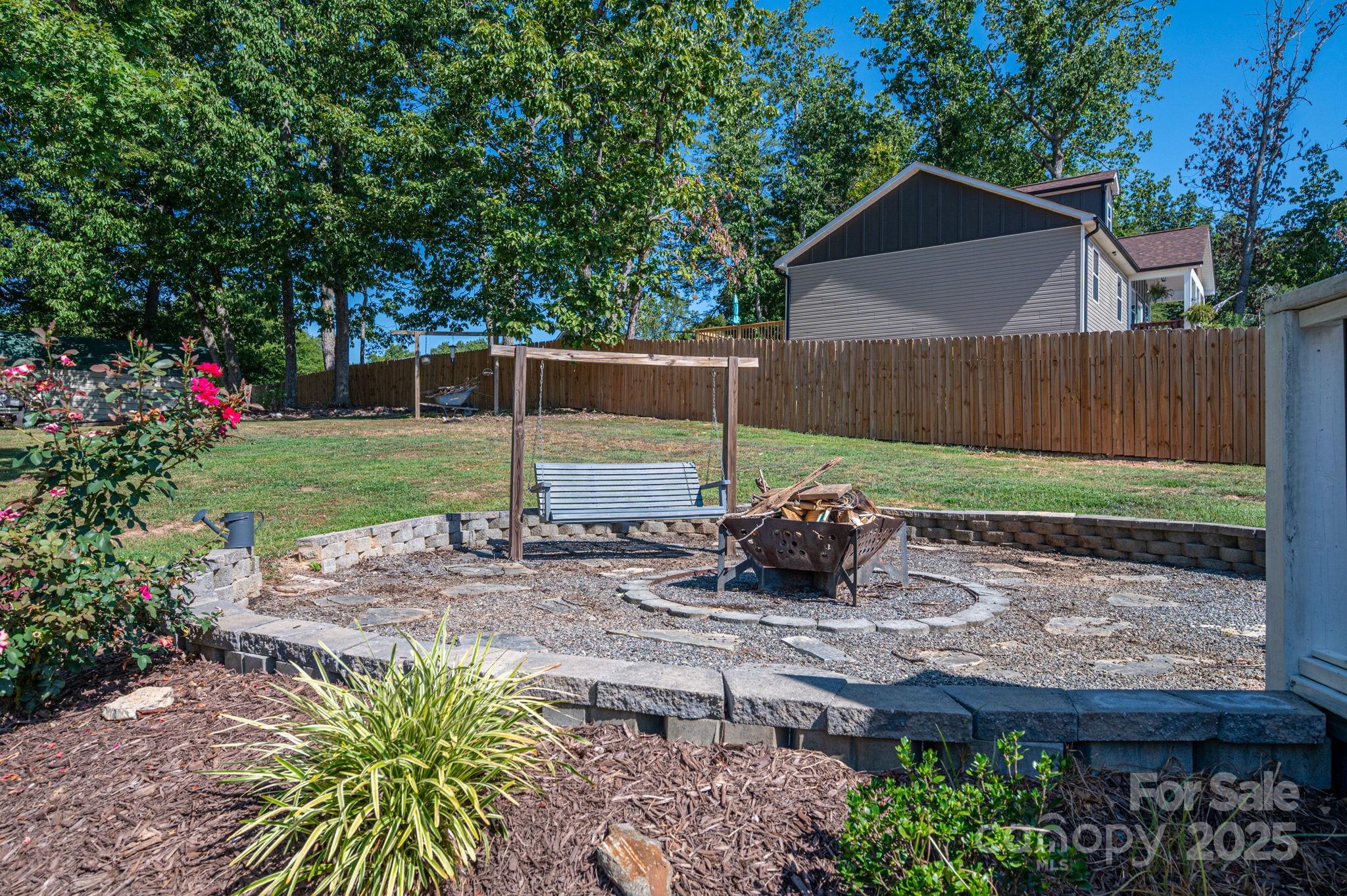 109 White Rock Road Grover, NC 28073 - Photo 33 of 37 a view of a house with backyard and sitting area