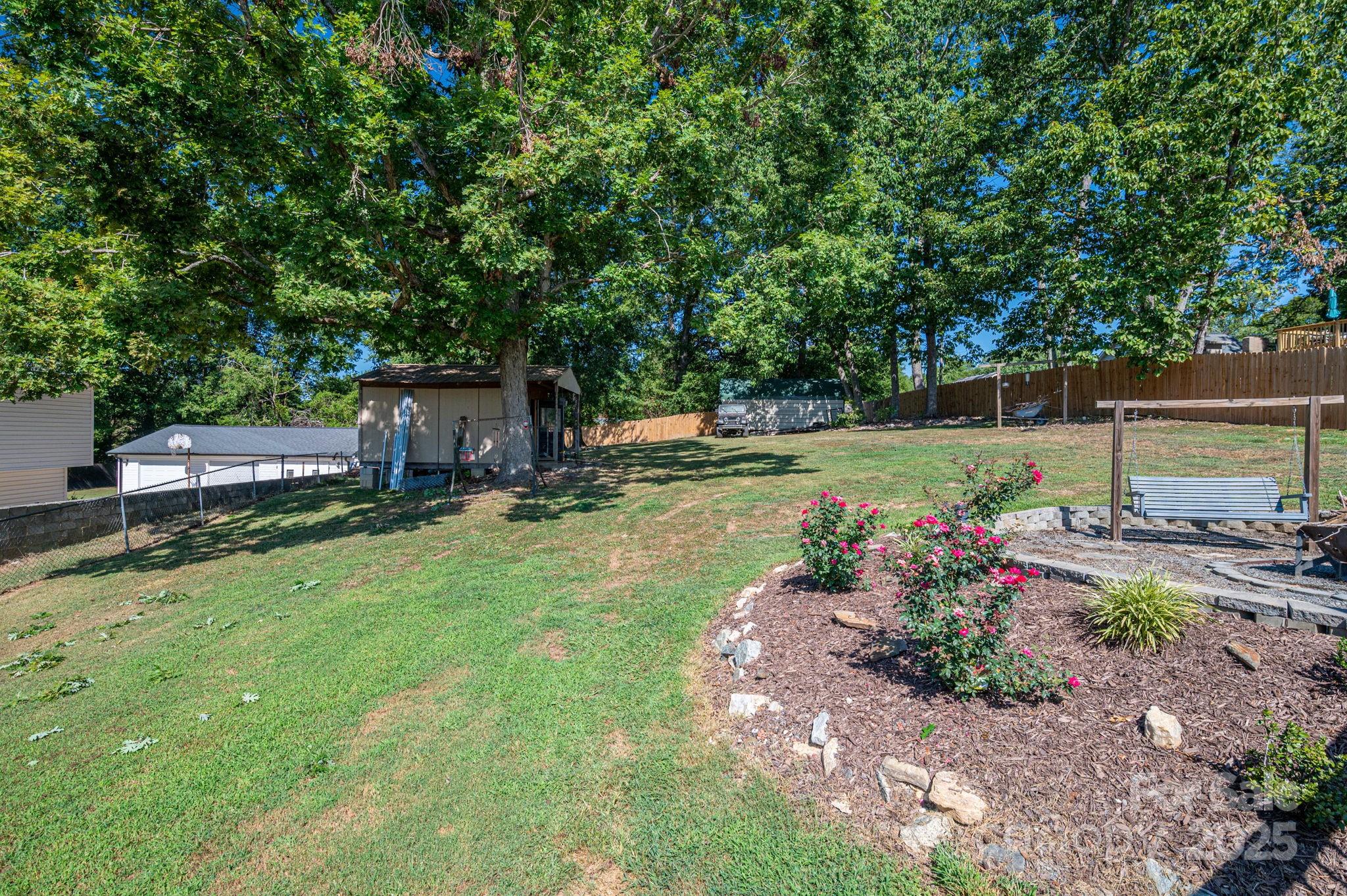 109 White Rock Road Grover, NC 28073 - Photo 34 of 37 a view of a backyard with garden