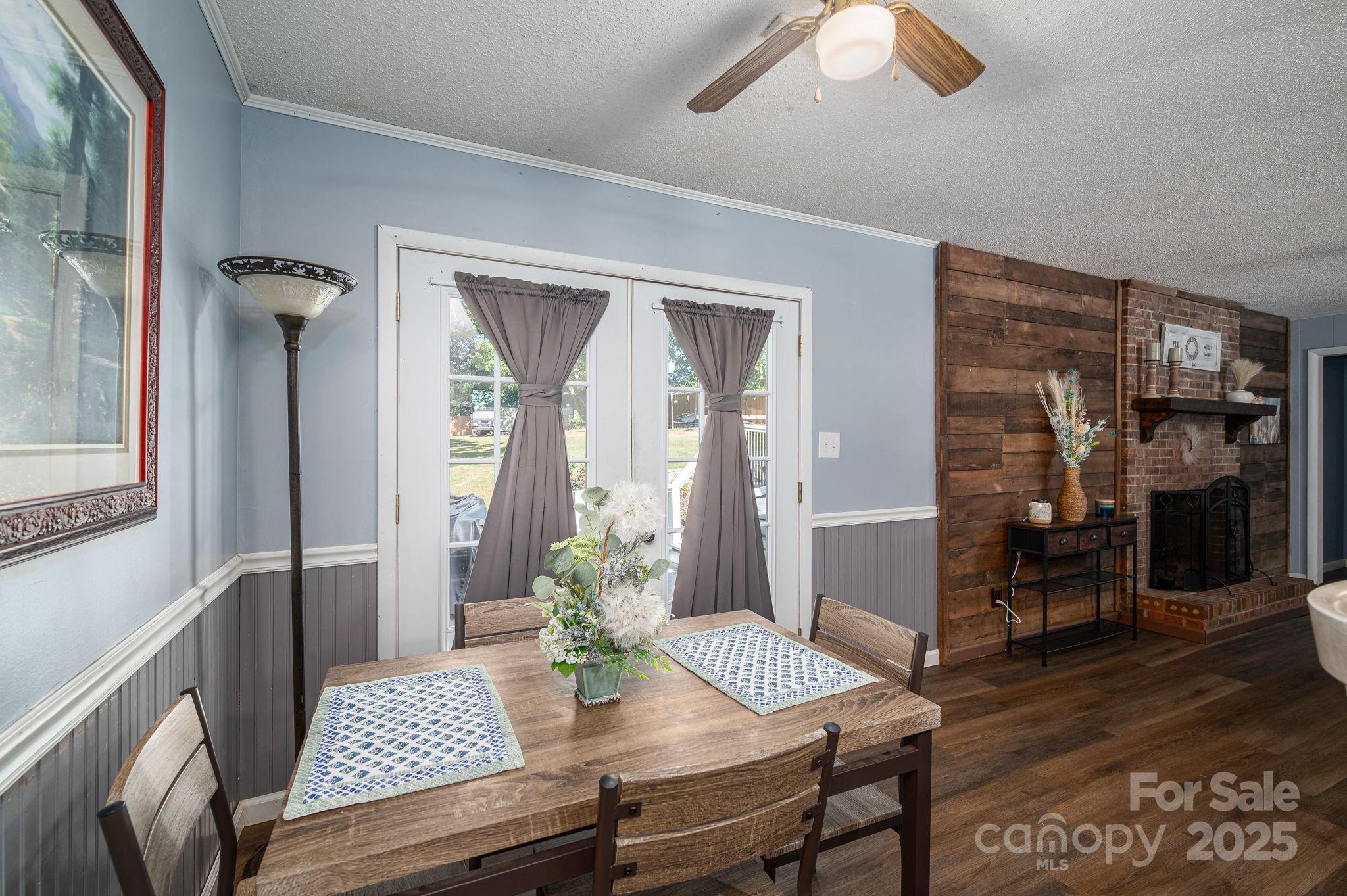 109 White Rock Road Grover, NC 28073 - Photo 6 of 37 a view of a dining room with furniture window and wooden floor