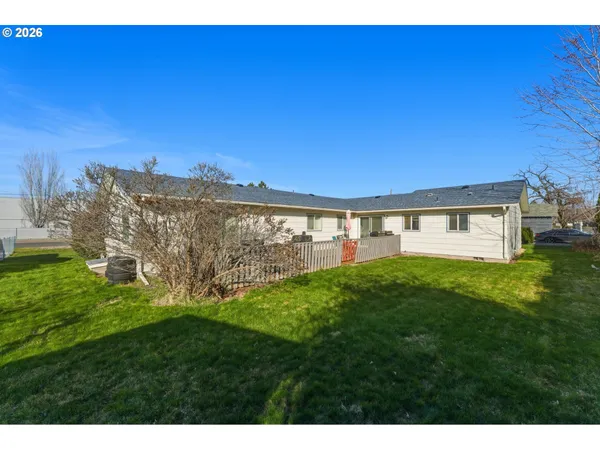 a view of a house with a big yard