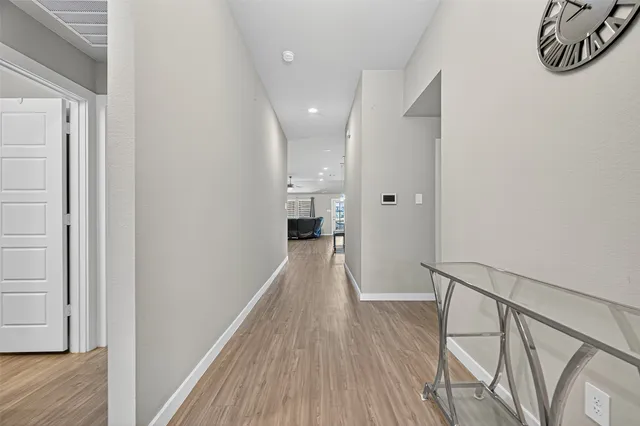 a view of a livingroom with furniture and wooden floor