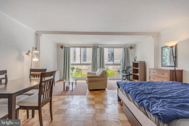 a living room with a couch and a table