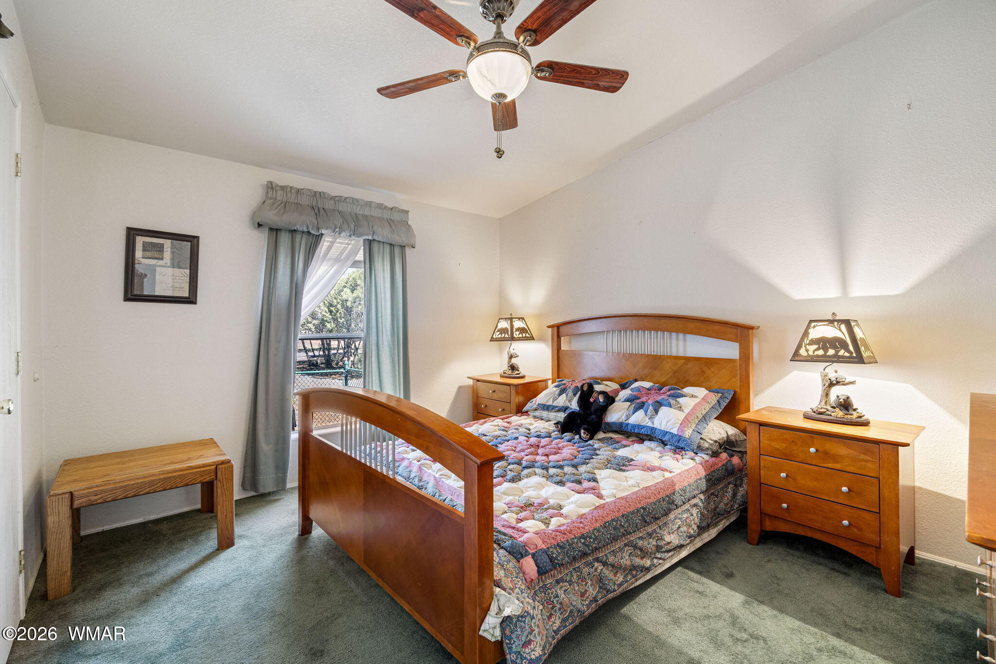 2908 Pine Rim Road Overgaard, AZ 85933 - Photo 18 of 34 a bedroom with a bed and a couch