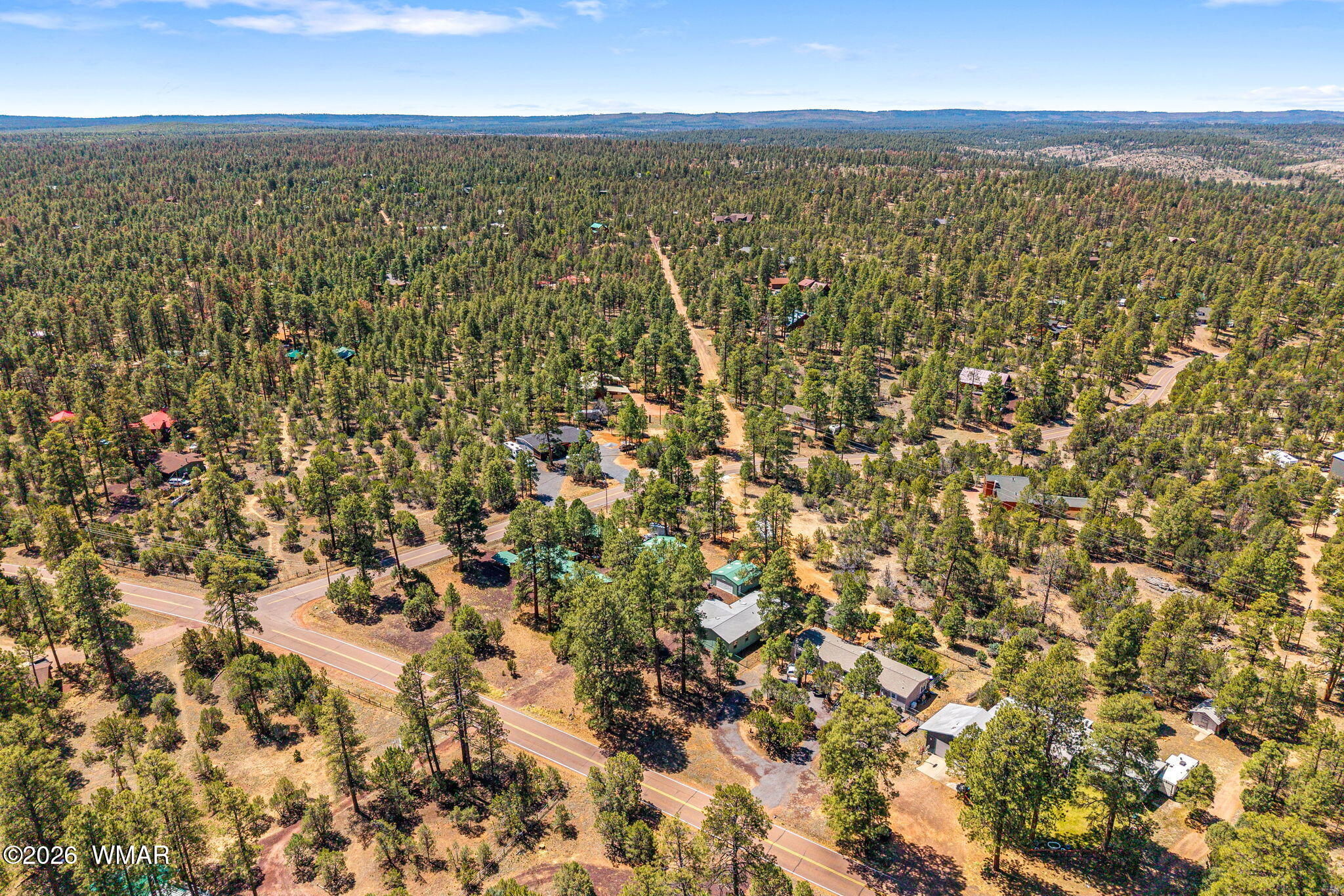 2908 Pine Rim Road Overgaard, AZ 85933 - Photo 32 of 34 an aerial view of residential houses with outdoor space
