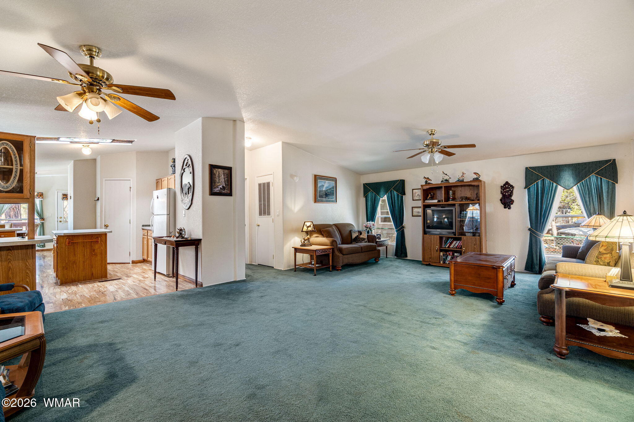 2908 Pine Rim Road Overgaard, AZ 85933 - Photo 7 of 34 a view of livingroom with furniture and a ceiling fan