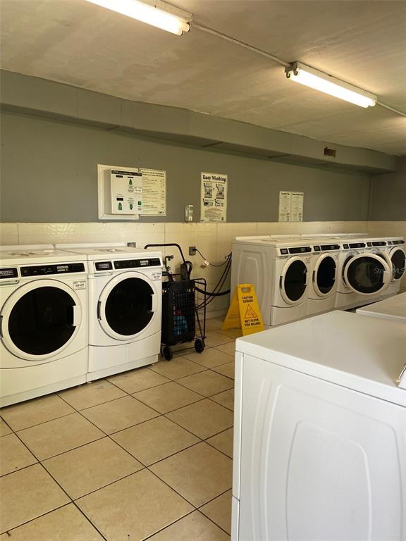 925 West Oak Ridge Road, Unit 925C Orlando, FL 32809 - Photo 15 of 15 a utility room with dryer and washer