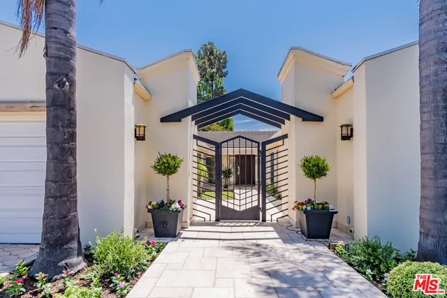 a house view with a outdoor space