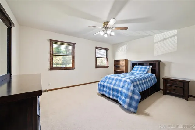 a view of a hallway with seating area