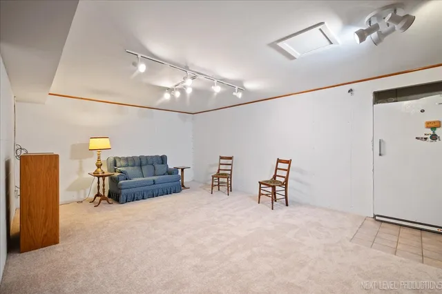 a terrace of a house with outdoor seating