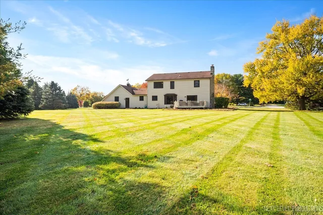 a view of an outdoor space and basketball court