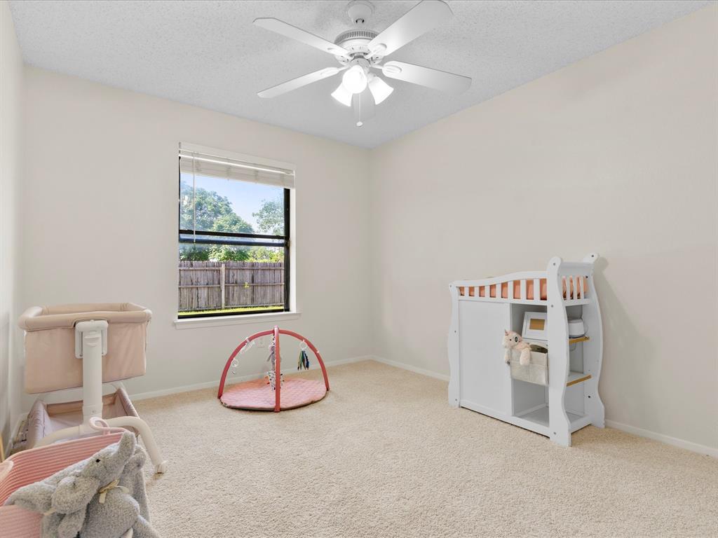 5900 Birchhill Road Watauga, TX 76148 - Photo 17 of 24 Bedroom 2
