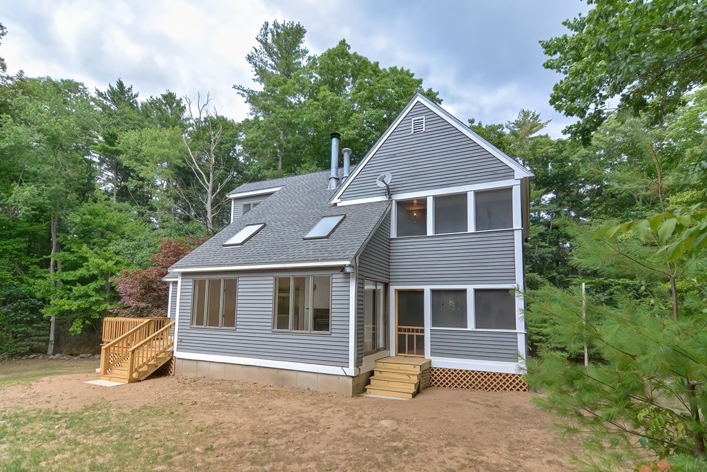 30 Lebel Road Rowley, MA 01969 - Photo 6 of 42 a front view of a house with a porch