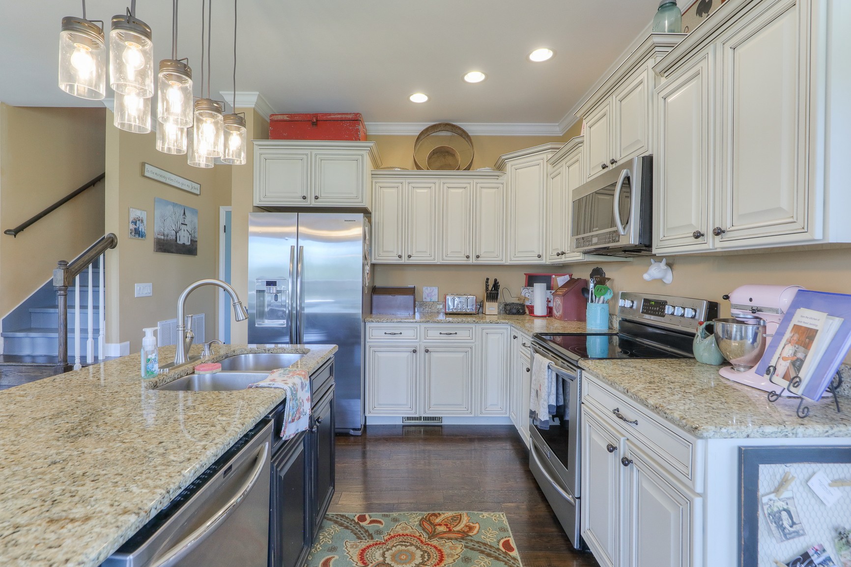 405 Burford Road Lebanon, TN 37087 - Photo 11 of 44 a kitchen with stainless steel appliances granite countertop a sink stove and cabinets