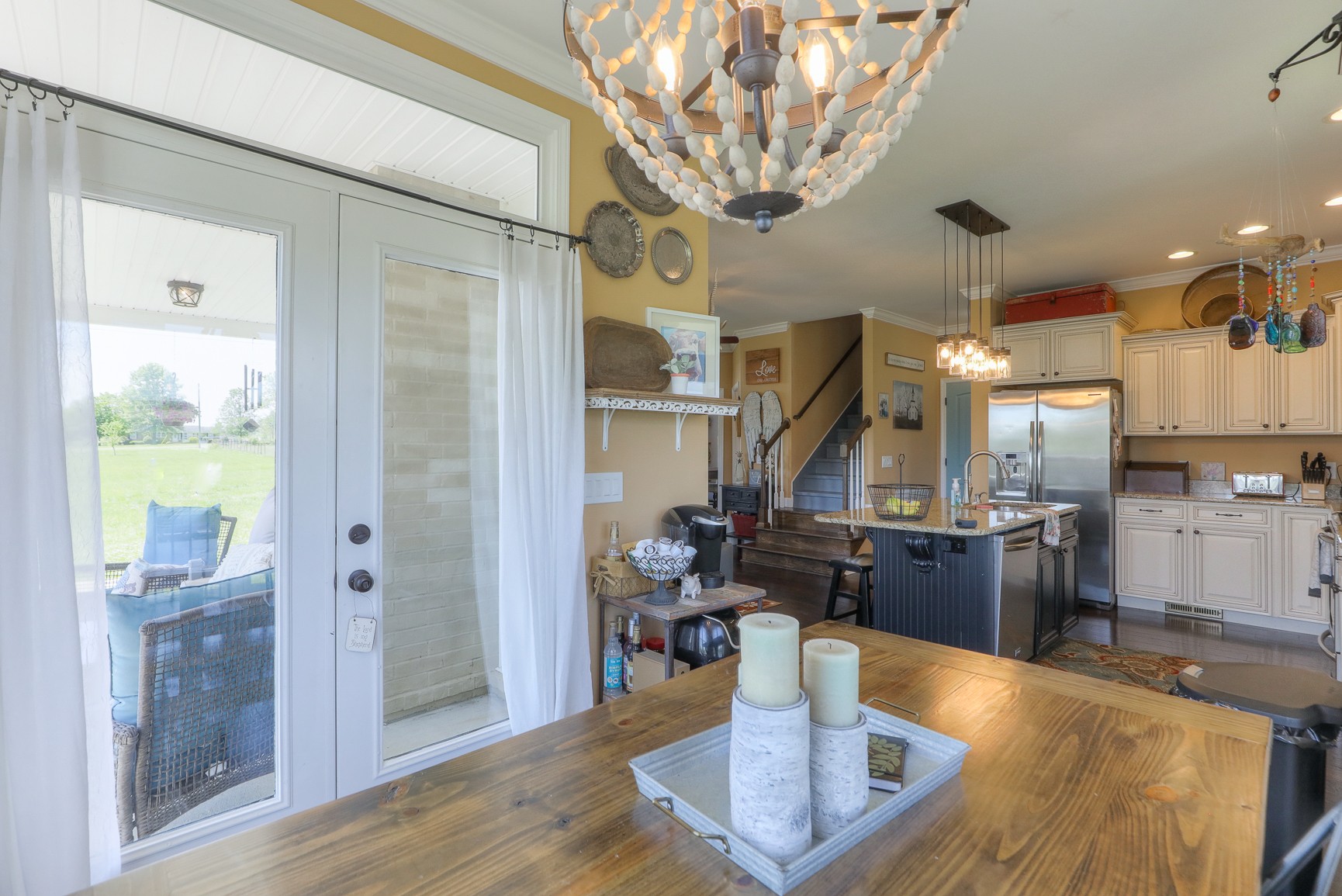 405 Burford Road Lebanon, TN 37087 - Photo 13 of 44 a kitchen with a dining table and chairs