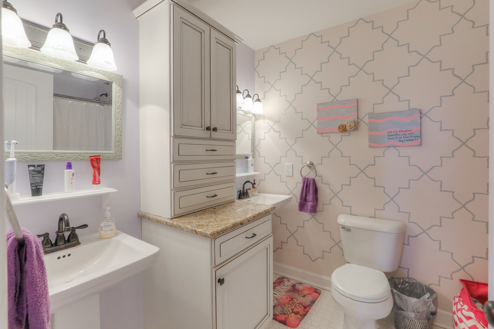 405 Burford Road Lebanon, TN 37087 - Photo 19 of 44 a bathroom with a sink toilet vanity and tub
