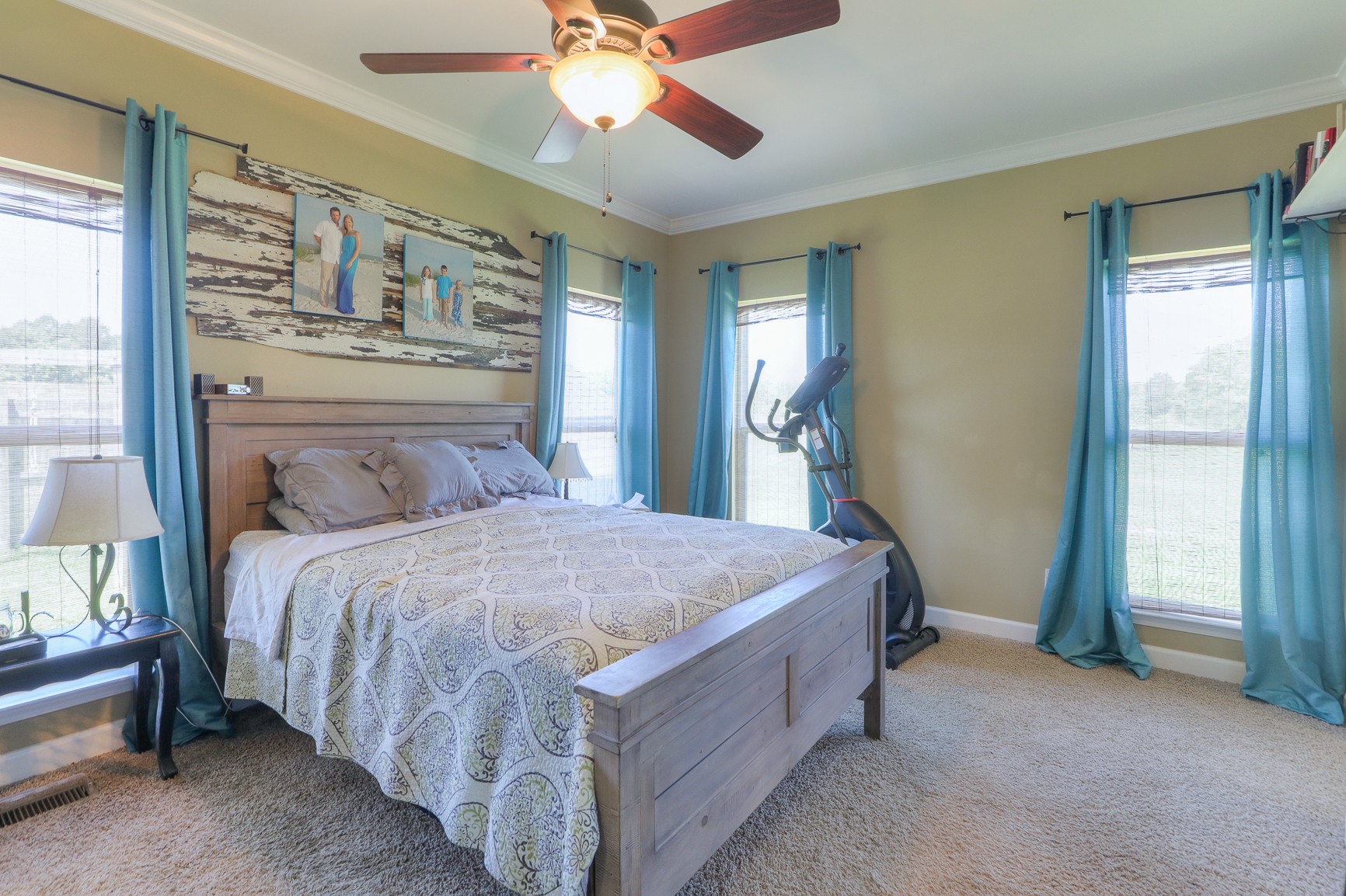 405 Burford Road Lebanon, TN 37087 - Photo 23 of 44 a bedroom with a bed and a chandelier