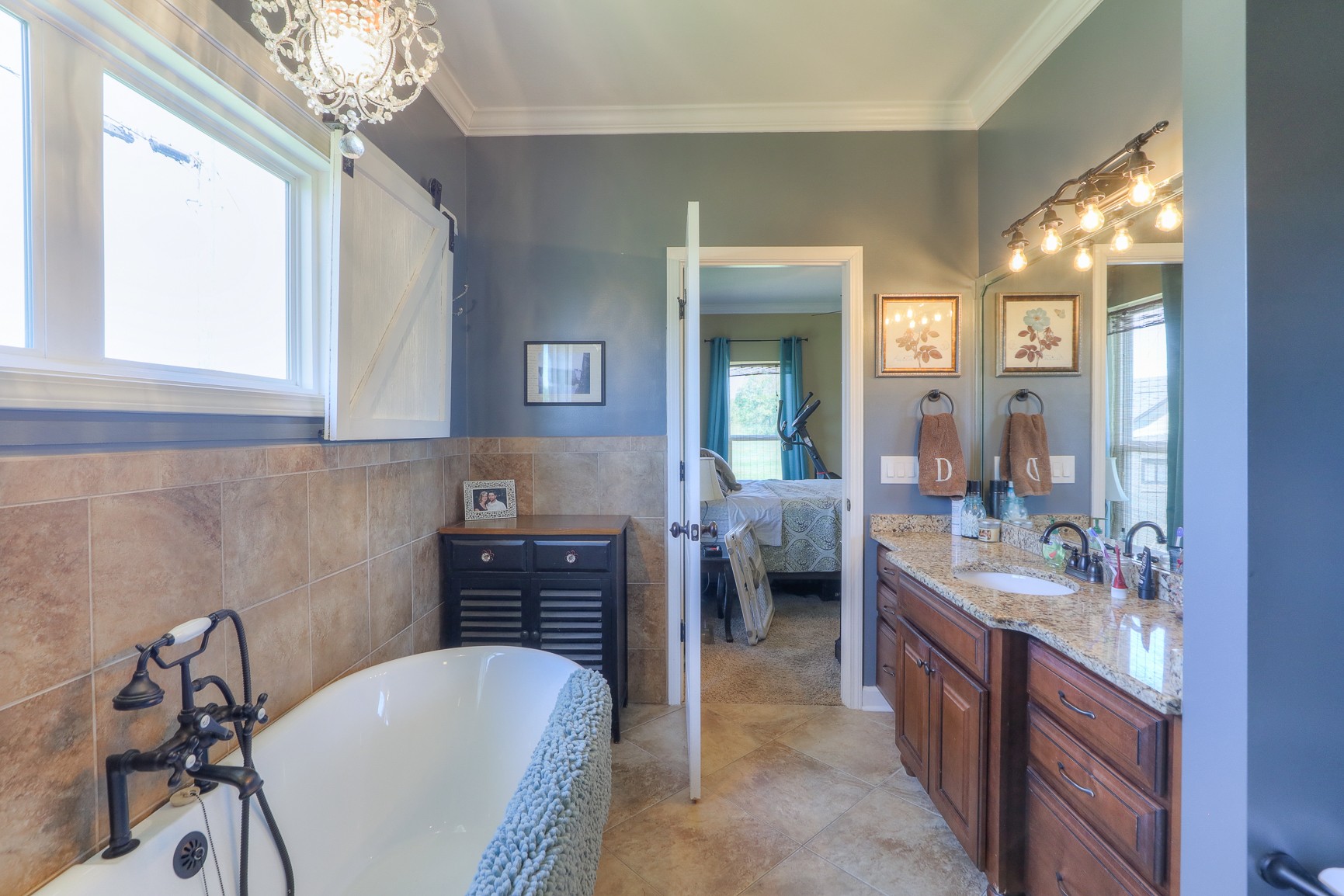 405 Burford Road Lebanon, TN 37087 - Photo 28 of 44 a spacious bathroom with a tub sink and mirror