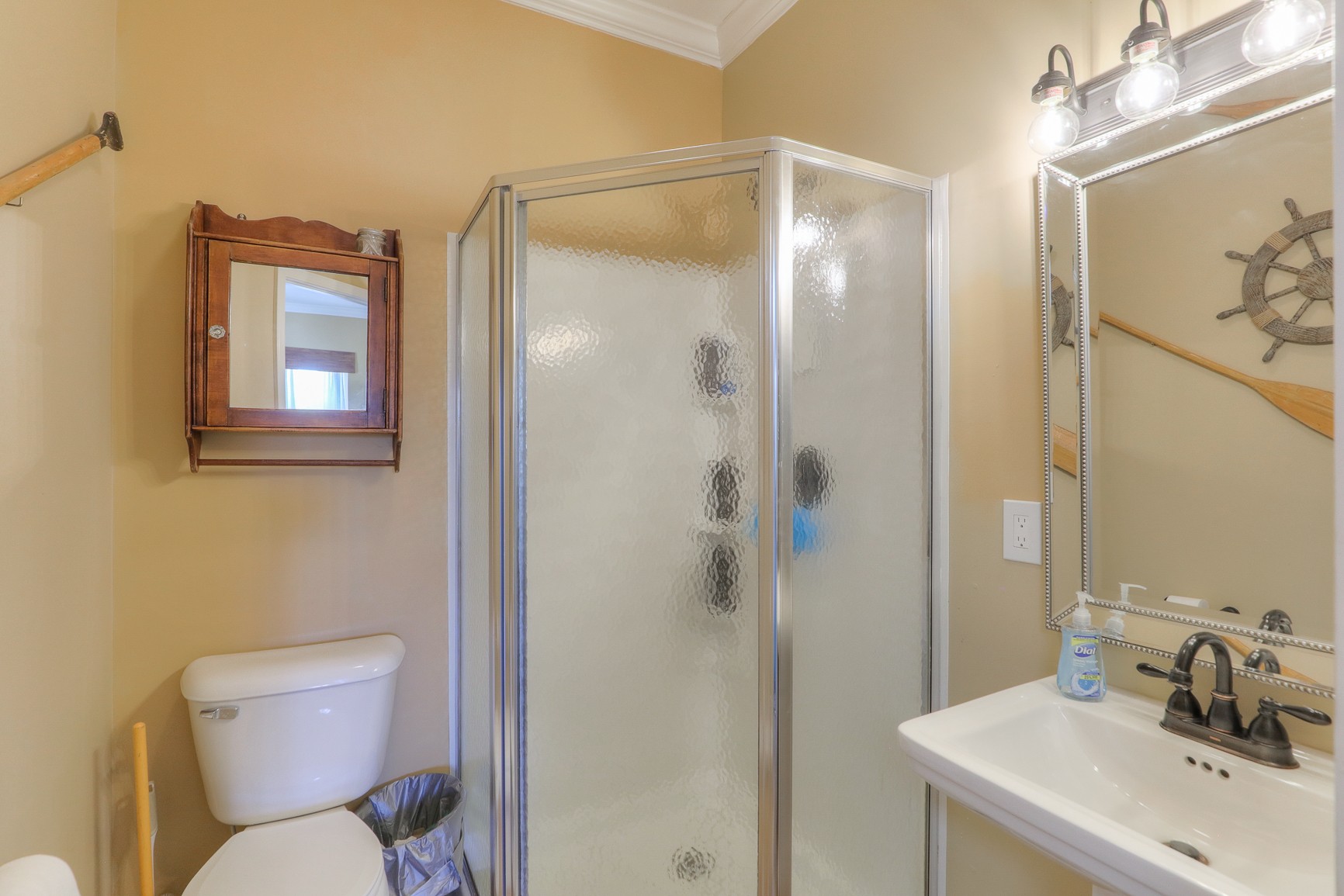 405 Burford Road Lebanon, TN 37087 - Photo 29 of 44 a bathroom with a toilet sink shower and mirror