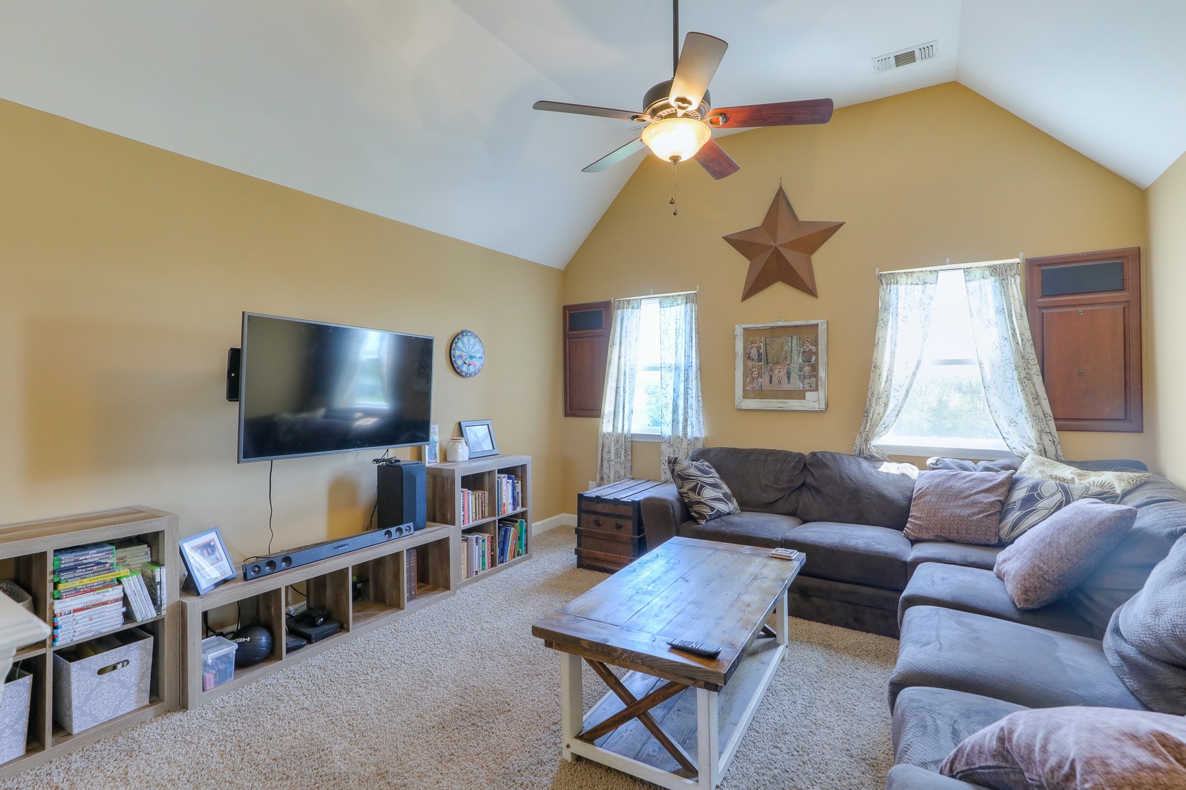 405 Burford Road Lebanon, TN 37087 - Photo 32 of 44 a living room with furniture and a flat screen tv